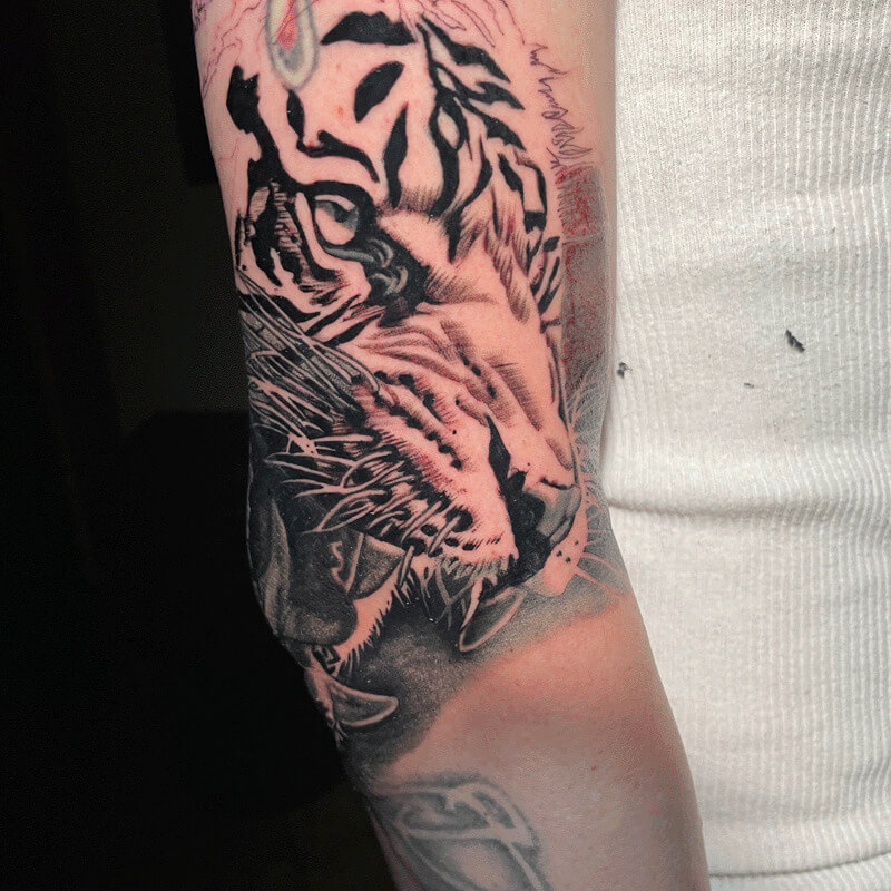 Tiger tattoo on arm