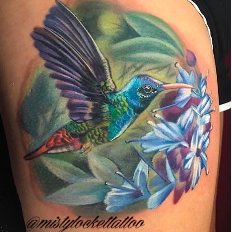 color humming bird tattoo on shoulder